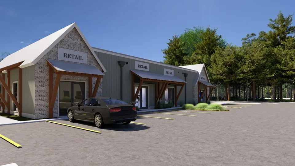 Arrival-side rendering with storefronts facing the parking area.